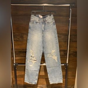 H&M Lose straight leg high rise ripped jeans.